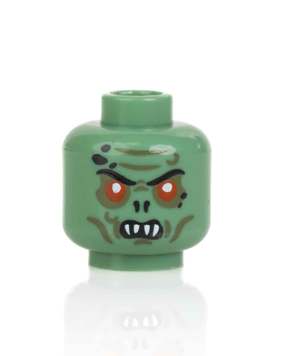 orc-snarl-head-sand-